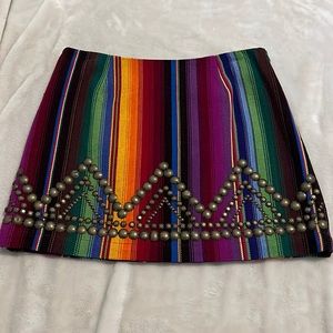 Serape embellished skirt with side zipper.